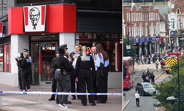 Four stabbed in KFC 'machete gang fight': Man fights for life and three others injured after knife attack in Bromley -…