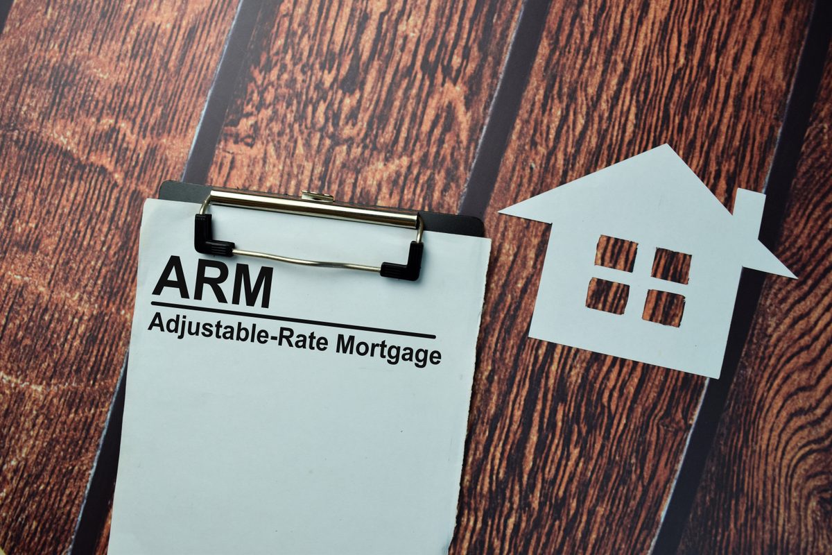 What is an adjustable-rate mortgage (ARM), and what are the risks?