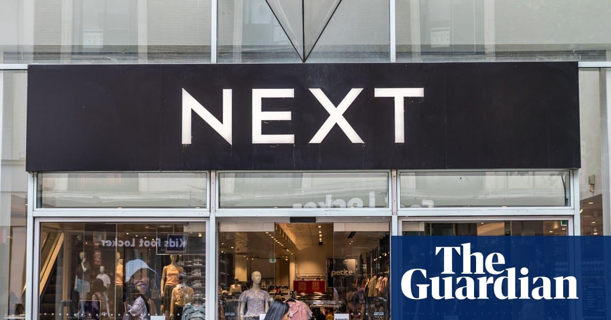 Next forecasts bigger profits after hot weather lifts sales