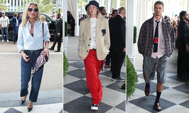 Kate Moss keeps it casual in a signature Tommy Hilfiger shirt as she joins Gigi Hadid and Romeo Beckham at New York Fas…