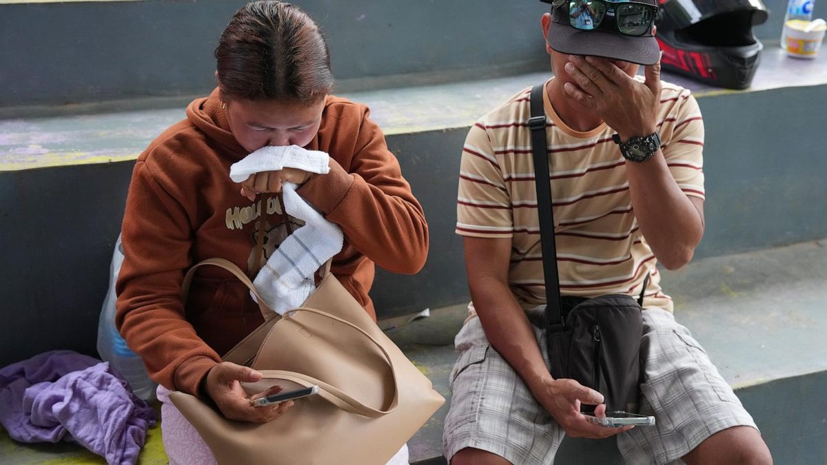 Philippine firefighters enter charred ferry as rescuers search for 84 missing