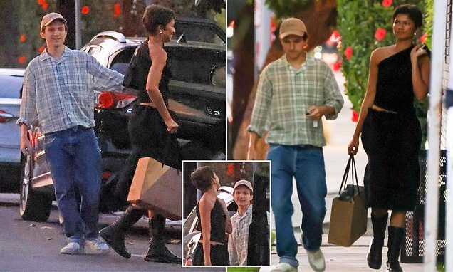 Zendaya steals the spotlight from VERY casual husband Tom Holland in ab-flashing designer look... after loved-up Emmys…
