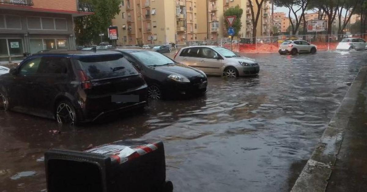 L'acqua travolge tutto: intense precipitazioni a Roma, strade allagate in Piazza Lorenzo Lotto