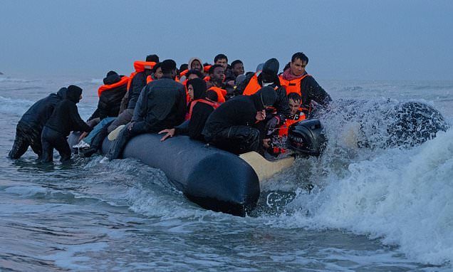 Another packed migrant mega-dinghy heads to Britain from Normandy - with a full French safety escort