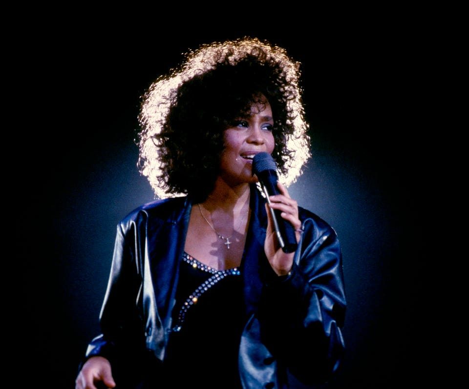 Whitney Houston Soars Back Onto The Charts After Dolly Parton’s Passing
