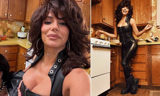 Eva Longoria wears a bouffant wig as she slips into a leather corset and rubber leggings for Ugg collaboration