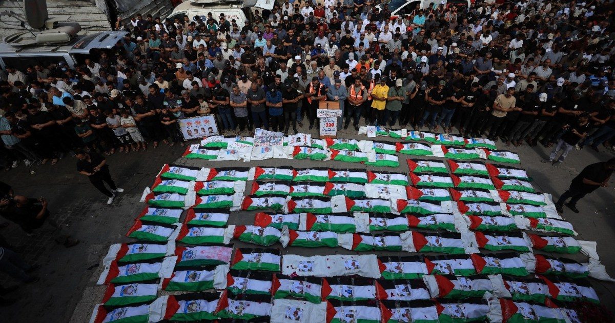 Palestinians mourn loved ones in mass funeral in Gaza City