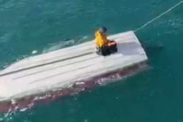 Schoolboy, 15, rescued after clinging to capsized boat for three days at sea