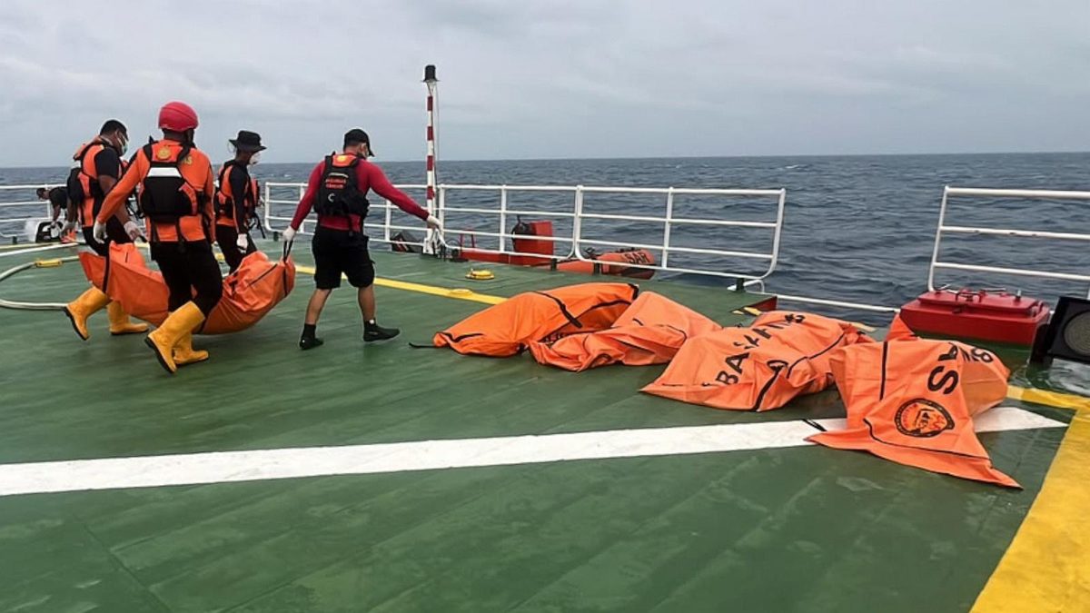 Divers recover a total of 52 bodies from capsized ferry in Indonesia after a dayslong search