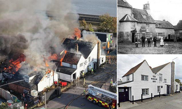 Centuries-old Grade II-listed pub where Pepys and Defoe drank burns down in 'heartbreaking' fire as man in his 20s is a…