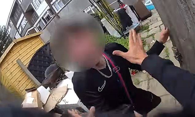 Moment county lines drug dealer flees chainsaw-wielding police smashing down his front door - only to be grabbed by mac…