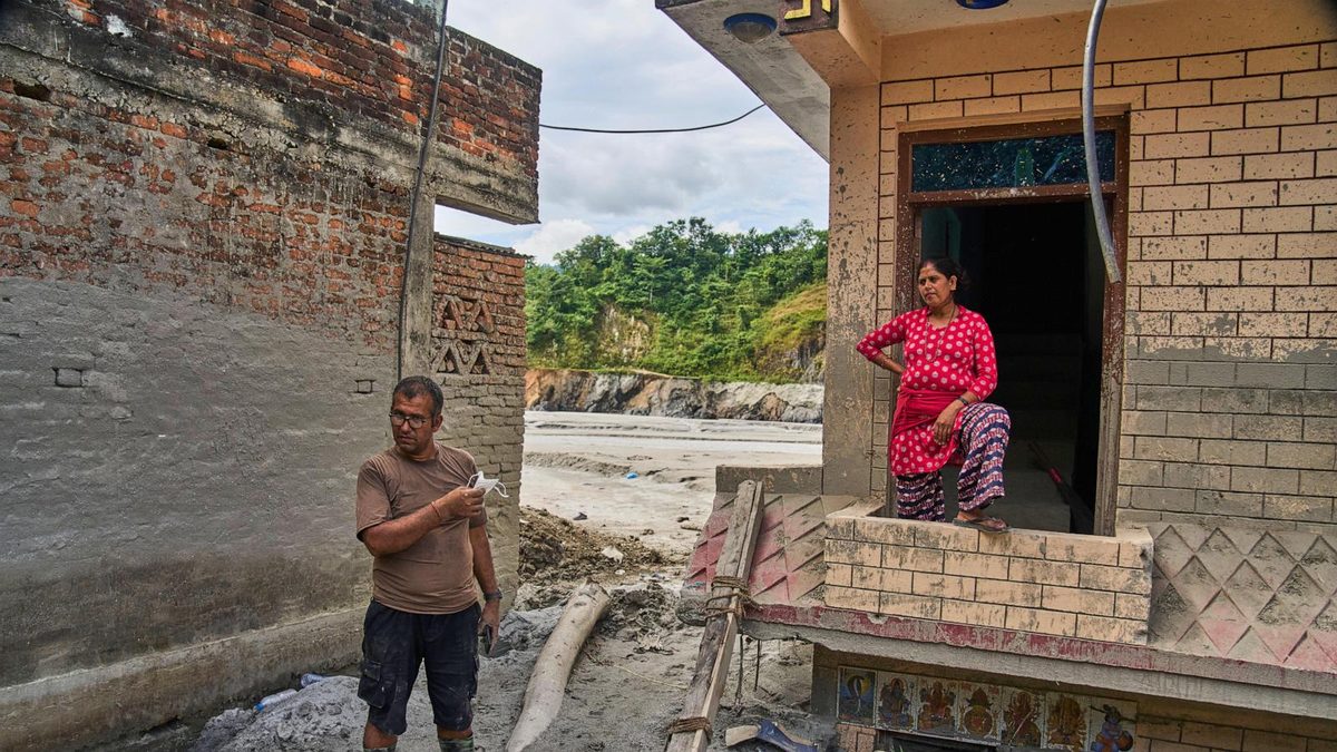 A month after Nepal floods, thousands are still missing and families face a long recovery