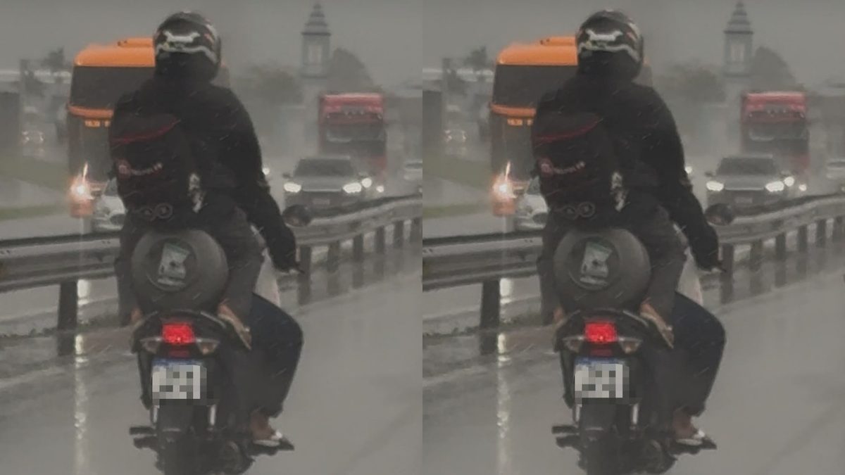 VÍDEO: Passageira é flagrada sentada em botijão de gás na garupa de moto na BR-101 em SC