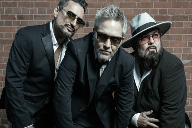 Fun Lovin’ Criminals share how Michael Fassbender went 'bright red' as he rapped their hit record back to them
