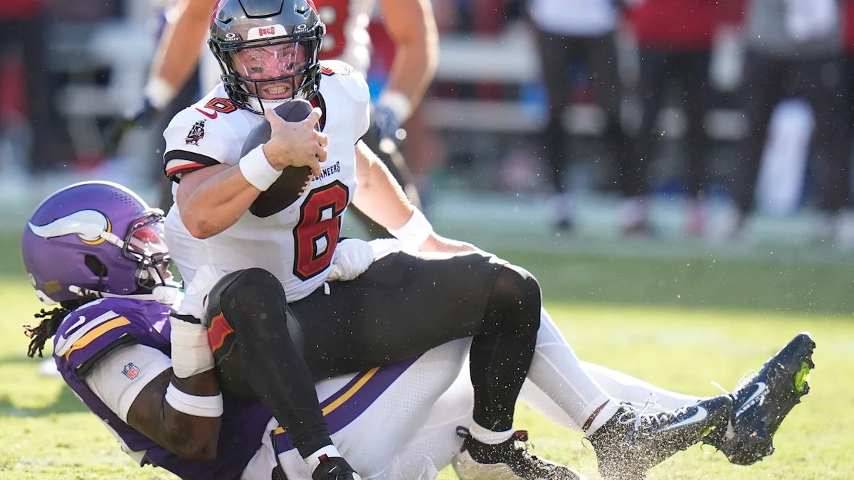 Buccaneers fall to 0-3 with loss to Vikings, as Baker Mayfield hurts hand and Todd Bowles' seat gets hotter
