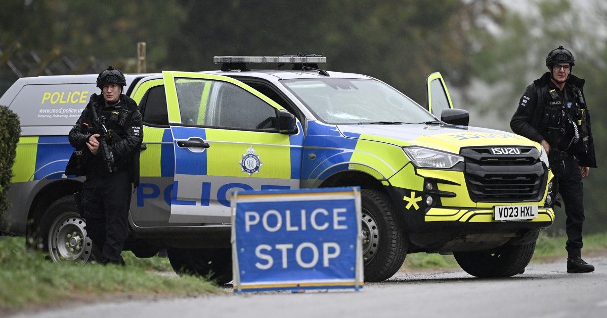 Men arrested on suspicion of explosives offences near U.S. air base in Britain as vehicles searched