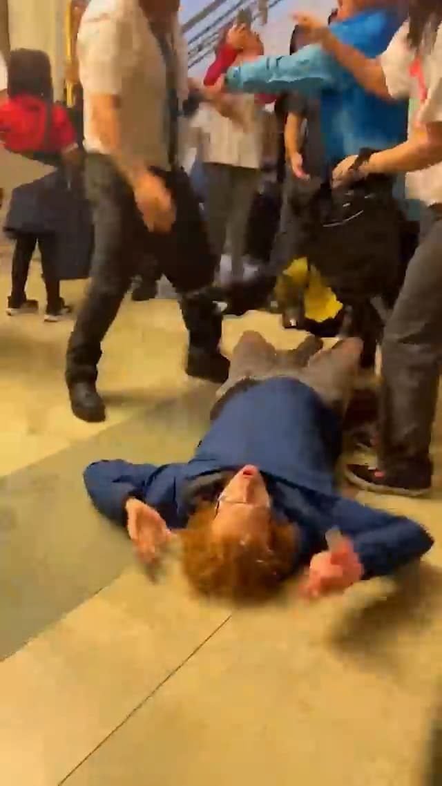 Moment protester 'thrown to the ground' by Hackney Council security officer