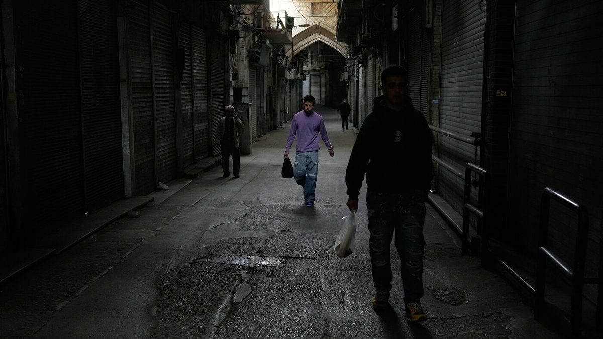Amid war and sanctions, many Iranians are losing their jobs and struggling to get by