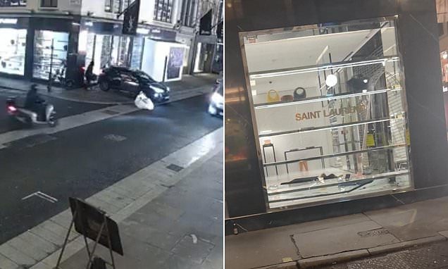 Moment ram raid gang smash their way into Yves Saint Laurent before stealing £30,000 worth of luxury handbags in nightt…