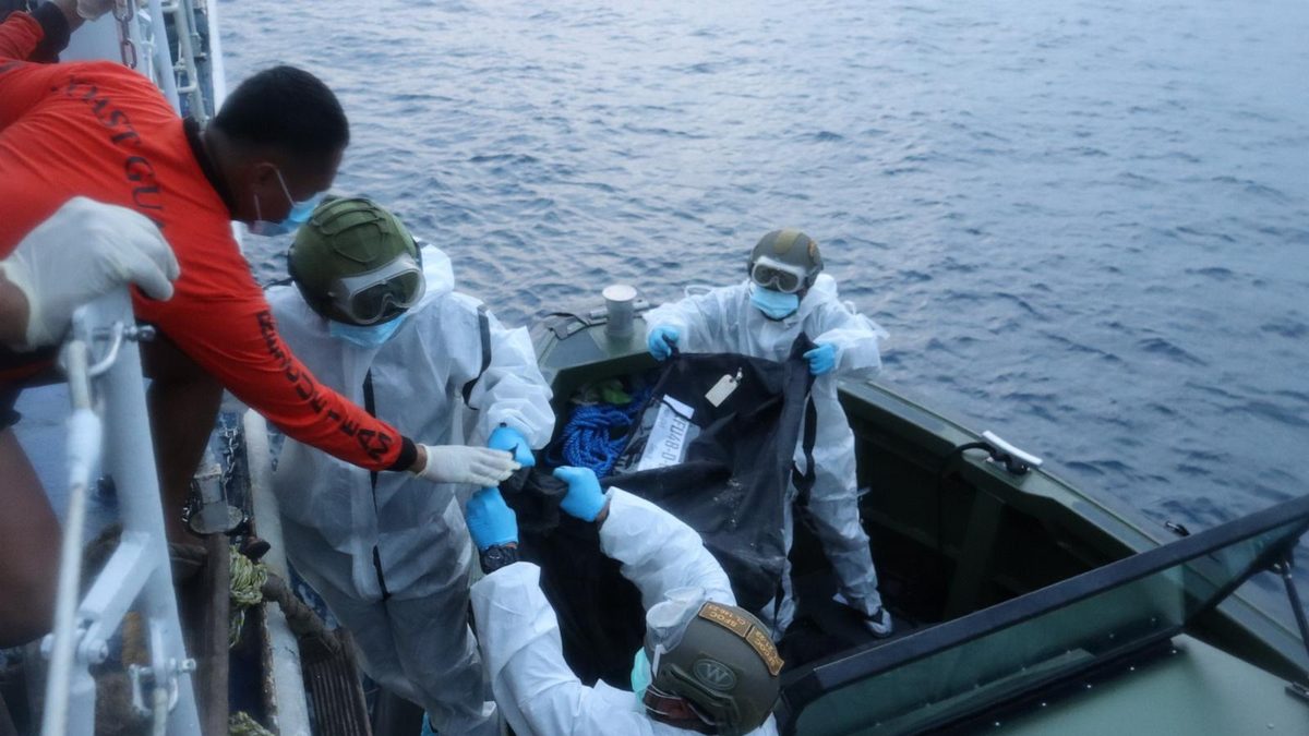 Bodies from charred Philippine ferry arrive at port after fire that killed at least 35