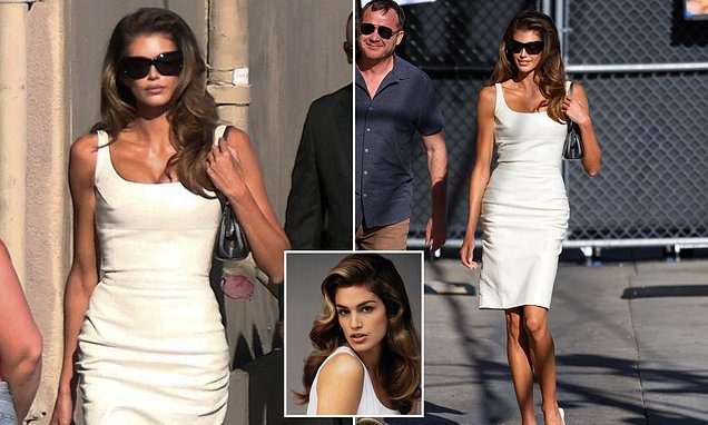 Kaia Gerber, 25, is mom Cindy Crawford's TWIN as she arrives at Jimmy Kimmel Live... before dishing on 'uncle' George C…