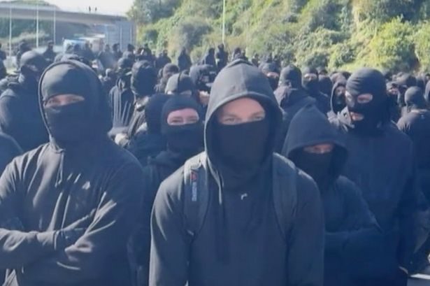 Man becomes first arrested for 'concealing his identity' hours after face covering ban