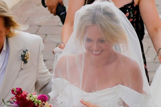 Emily Atack stuns in second wedding to Alistair Garner after arriving in a vintage Cadillac