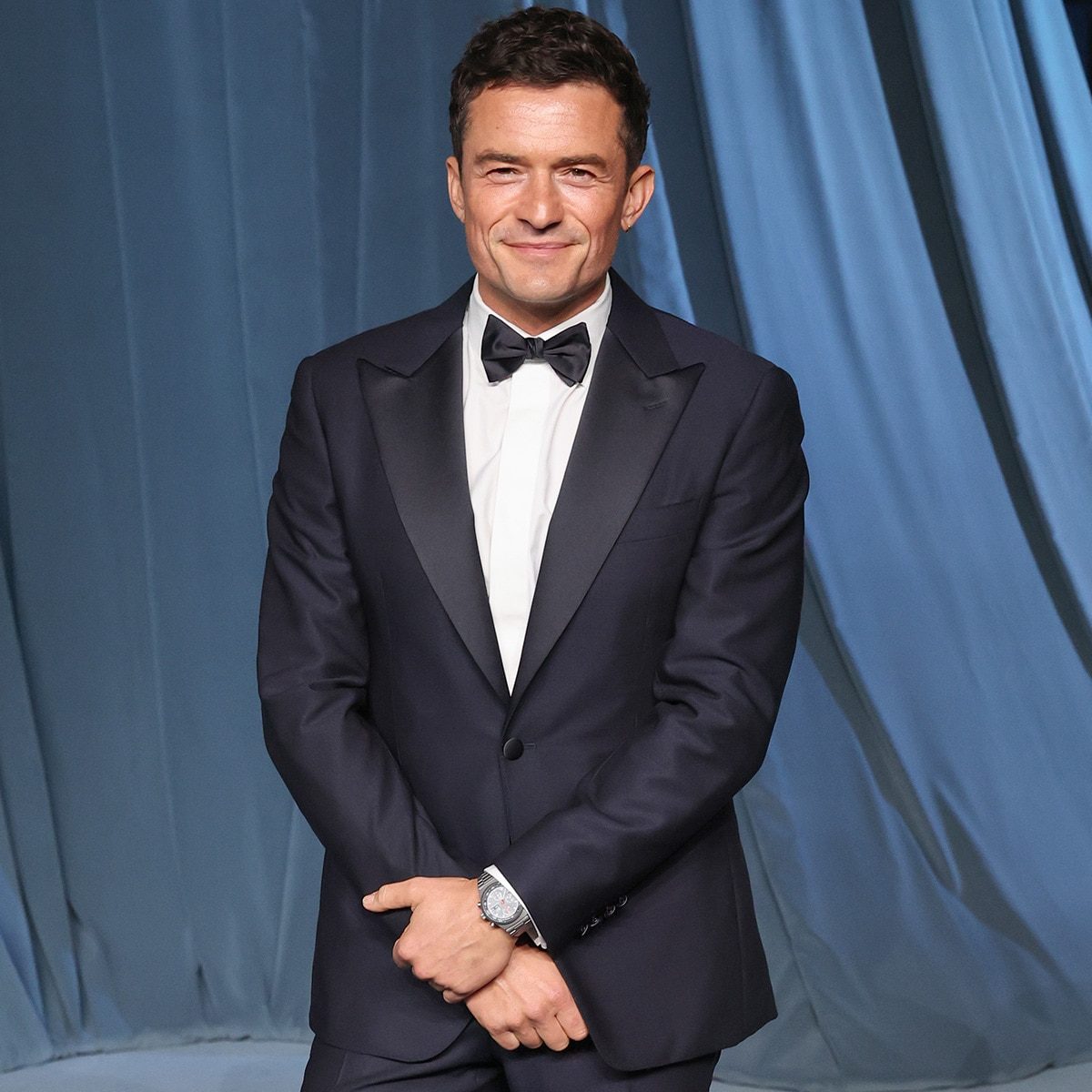 Orlando Bloom Shows Off Rock-Solid Abs During Family Getaway