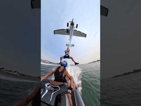 this vlog is insane, they're surfing on waves created by this massive yacht