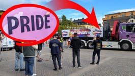 Scanias drag: Parkerade framför motdemonstranter
