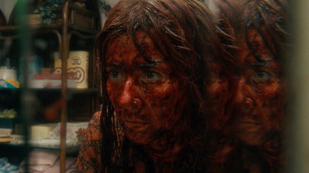 Linda Cardellini lets her unhinged side out in the full trailer for Peacock's Crystal Lake