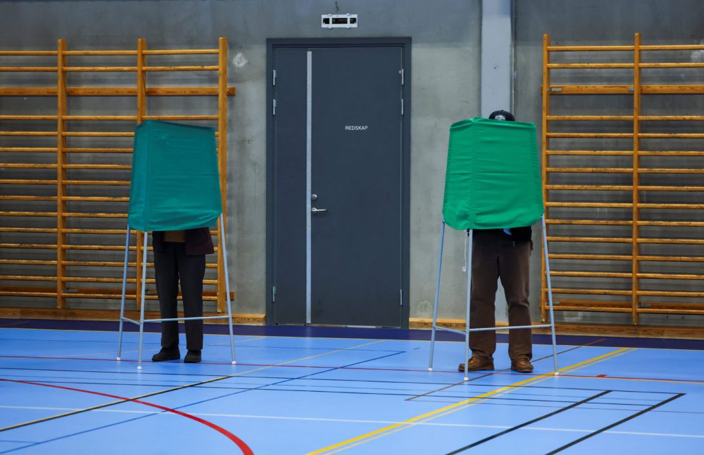 Exit polls show left-wing opposition ahead in Swedish vote, projected to win majority