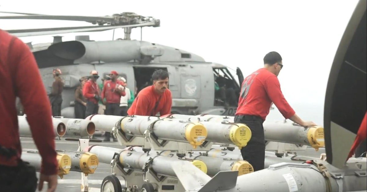 CBS News gets exclusive access to a U.S. aircraft carrier in Middle East