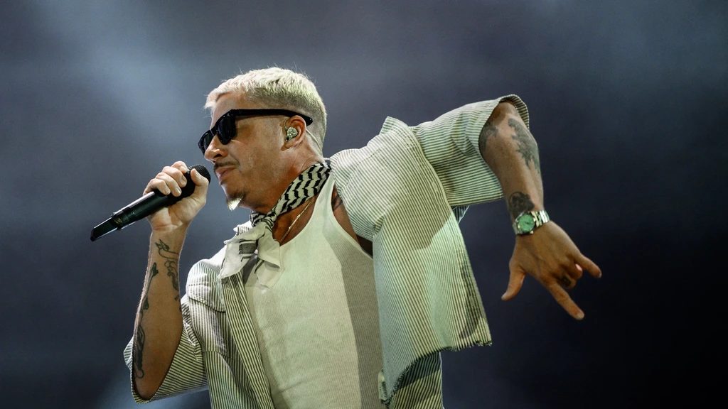 Macklemore uit voorprogramma Ed Sheeran geschrapt om pro-Palestijnse uitspraken