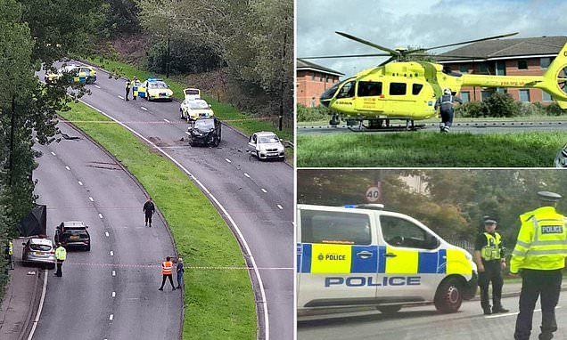 Two killed and four seriously hurt as car hits group of pedestrians before head-on crash on wrong side of road