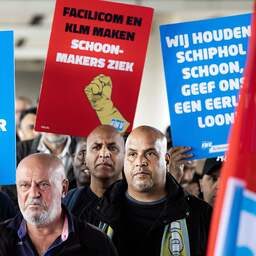 Schoonmakers staken voor tweede dag, Schiphol en stations merken nog weinig