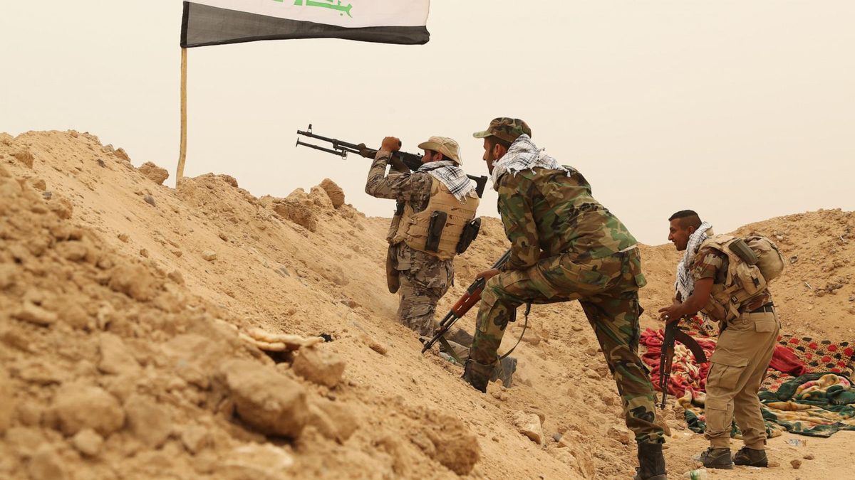 As the last US troops pack up in Iraq, militias signal their weapons will stay